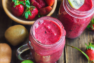 High angle view of fruits in jar on table