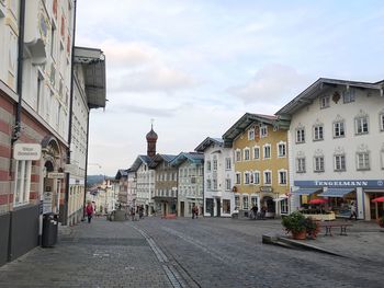 View of narrow street along buildings