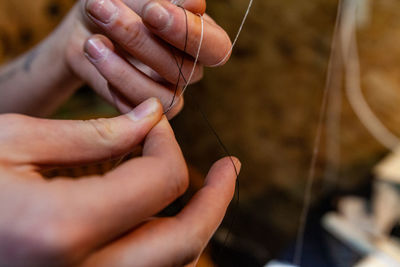 Close-up of hand holding hands