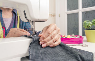 Midsection of woman working