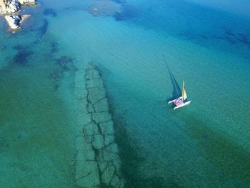 High angle view of sailboat in sea