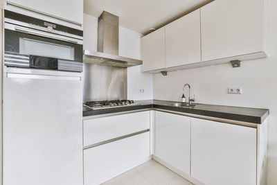 Close-up of gas stove in kitchen