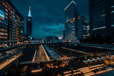 Illuminated buildings in city at night