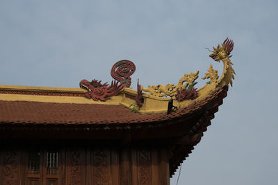 Low angle view of traditional building against sky