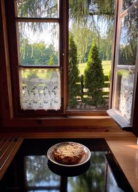 Trees seen through home window