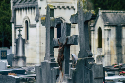 Close-up of cross at cemetery