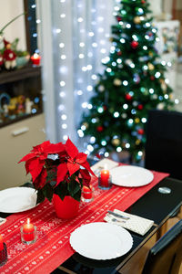 Illuminated christmas tree on table