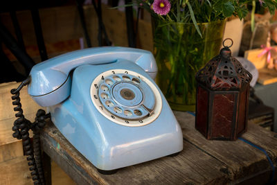 Close-up of telephone on table