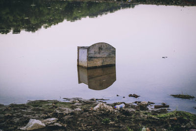 Reflection of built structure in lake