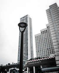 Low angle view of modern buildings against sky