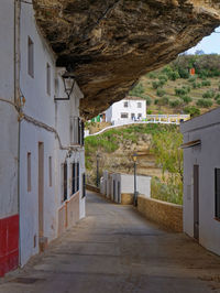 Narrow alley amidst buildings in town