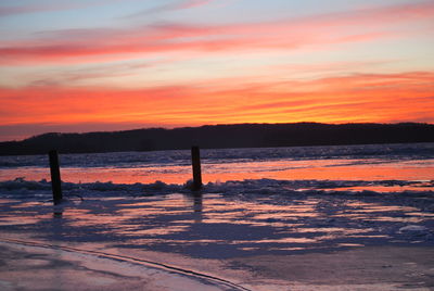 Scenic view of sea at sunset