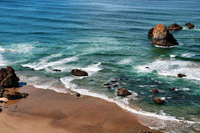 High angle view of rocks in sea