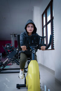 Portrait of boy riding bicycle