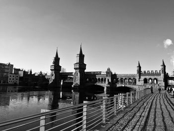 View of bridge over river in city