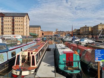 High angle view of buildings in city among docks in gloucester, uk