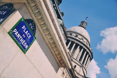 Low angle view of built structure against blue sky