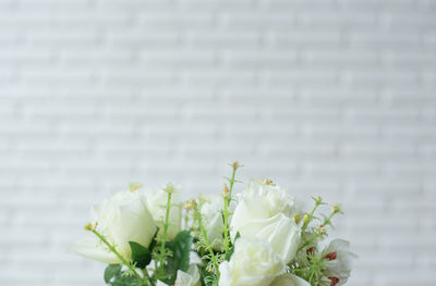 Flower bouquet on white wooden floor background with copy space.