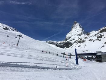 Idyllic shot of snowcapped mountains against sky