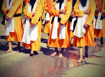 Low section of people on zebra crossing