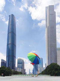 Modern buildings against sky in city