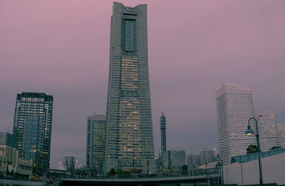 Low angle view of skyscrapers against sky