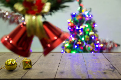 Illuminated christmas tree on table