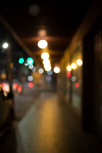 Defocused image of illuminated lights at night