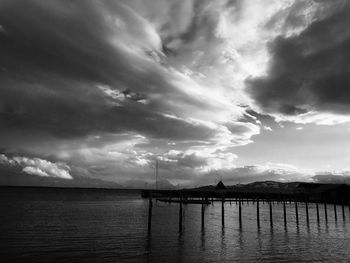 Scenic view of sea against cloudy sky