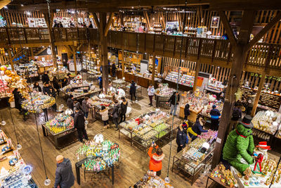 Group of people at market stall