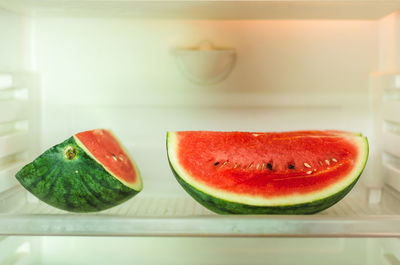 Close-up of watermelon slices in refrigerator