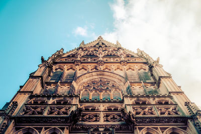 Low angle view of temple building against sky