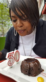 Portrait of woman eating food