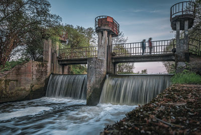 Bridge over waterfall