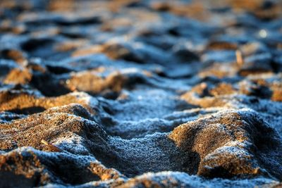 Close-up of pebbles on beach