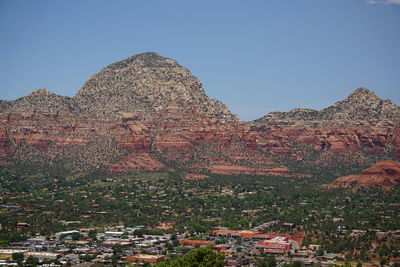 Scenic view of rocky mountains against clear sky