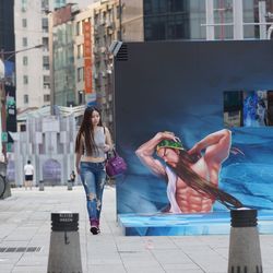 Woman standing in city