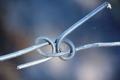 Close-up of chain links against blurred background