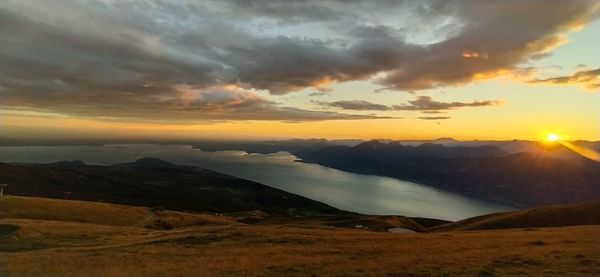 Scenic view of landscape against sky during sunset