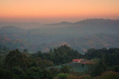 Scenic view of mountains against sky during sunset