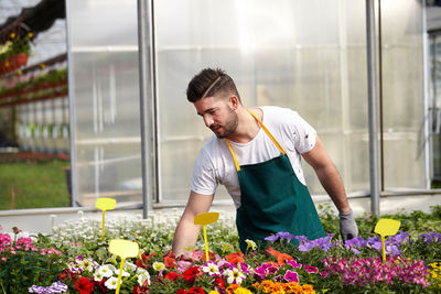 Man working in flower pot