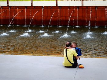 Full length of woman standing in water