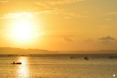 Scenic view of sunset over sea