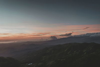 Scenic view of landscape against sky during sunset