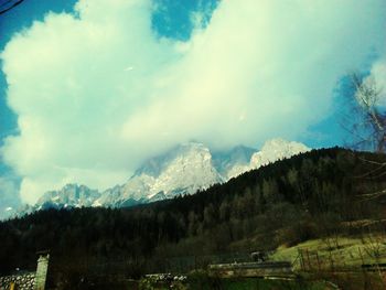 Scenic view of mountains against sky during winter