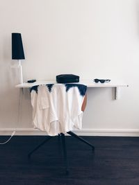 Early morning, black and white design and lonely t-shirt in the bedroom