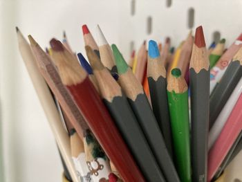 Close-up of colored pencils on table