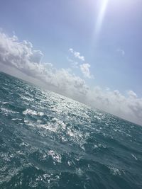 Sun shining through clouds