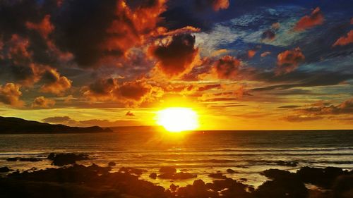 Scenic view of sea at sunset