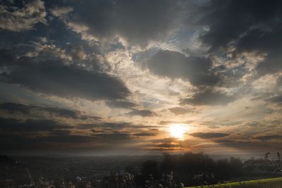 Scenic view of sunset over city